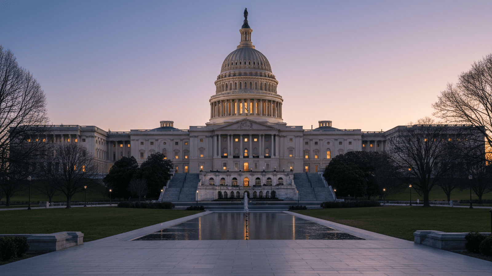 A steady and clear view of the U.S. Capitol building at dusk, representing a stable transition in government.