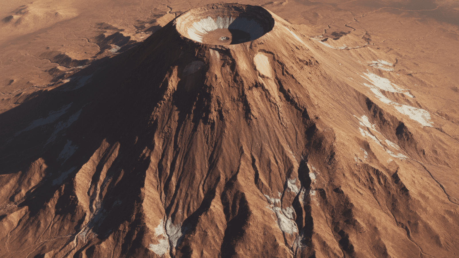 A vast, weathered volcanic structure on the Martian surface featuring complex ridges and deep tectonic fractures.