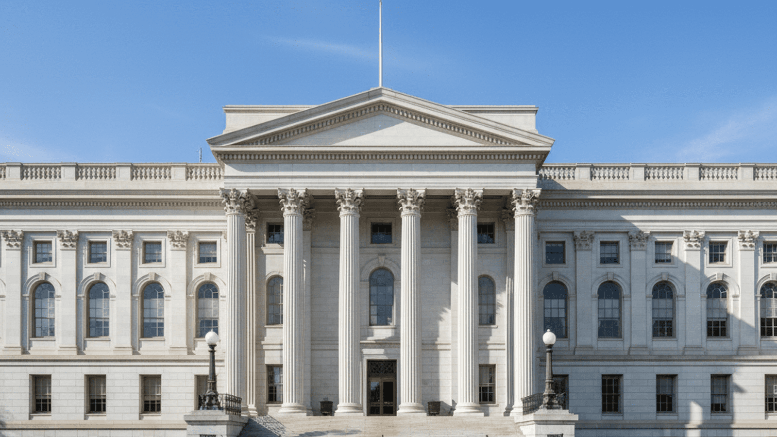 The exterior of the United States Treasury Building stands as a symbol of financial order and national security.