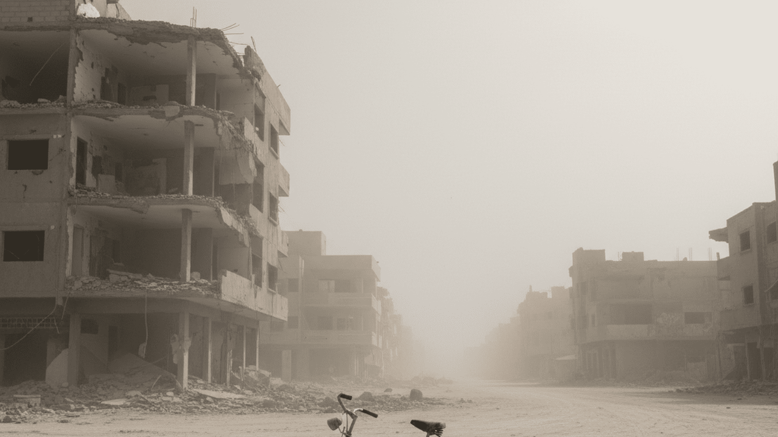 A quiet urban scene in Gaza showing a damaged building and a bicycle following a military strike.