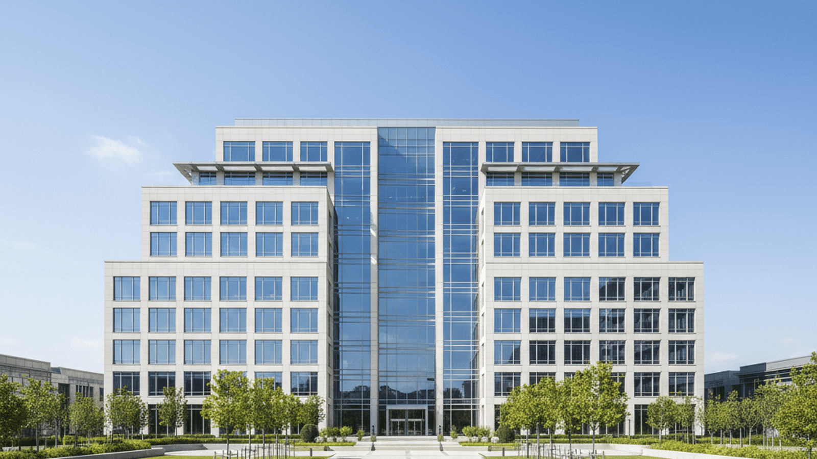 A modern corporate office building stands under a clear sky, symbolizing the resolution of the TikTok ownership transition.