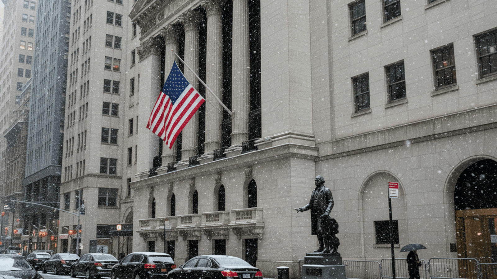 The New York Stock Exchange stands prominently during a snowstorm with an American flag displayed on the facade.