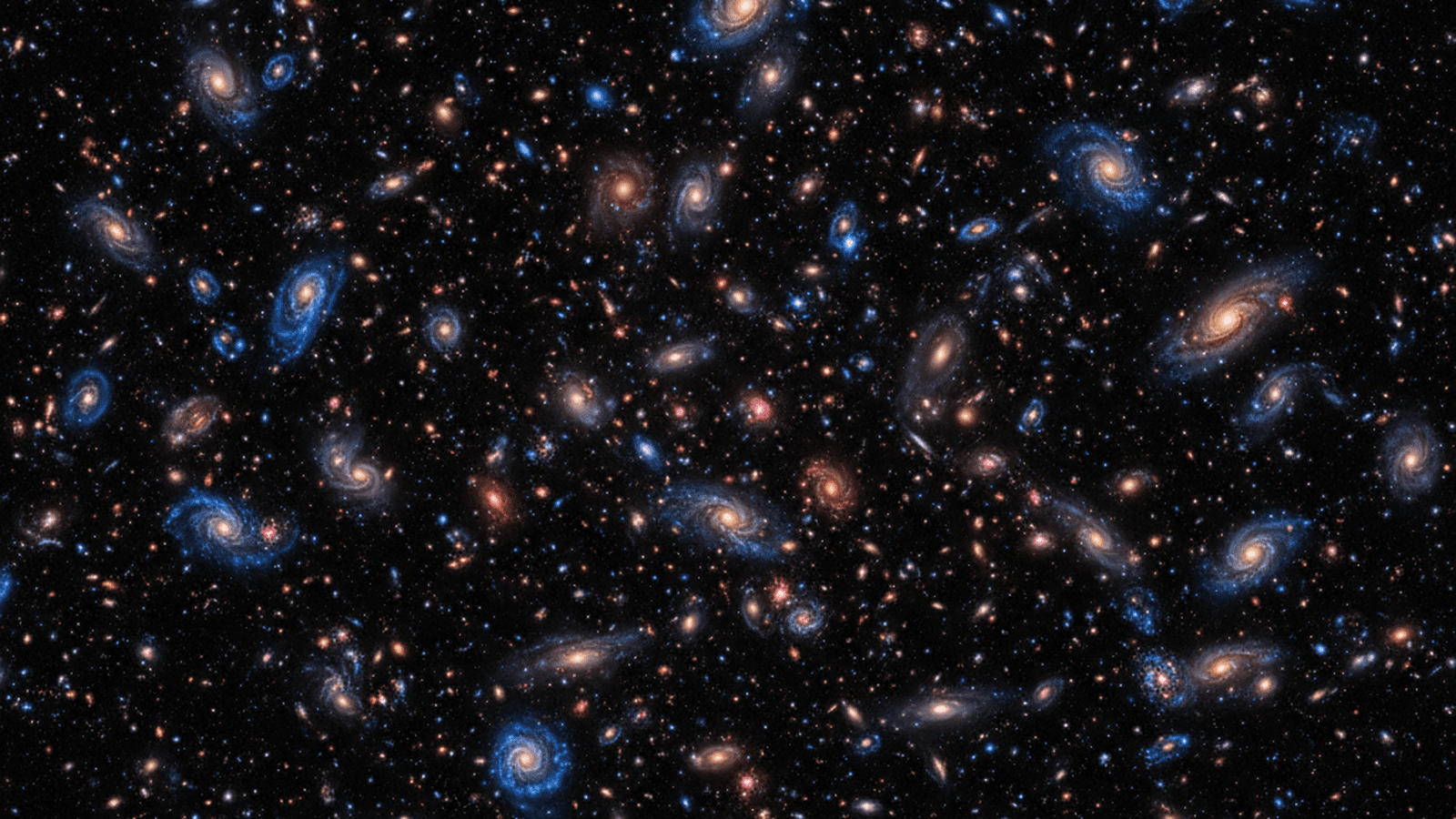 A high-resolution wide-field image of the Perseus Cluster showing thousands of galaxies against a dark sky.