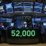 Dow Hits Record 52,000 as Energy Costs Plunge on Ceasefire