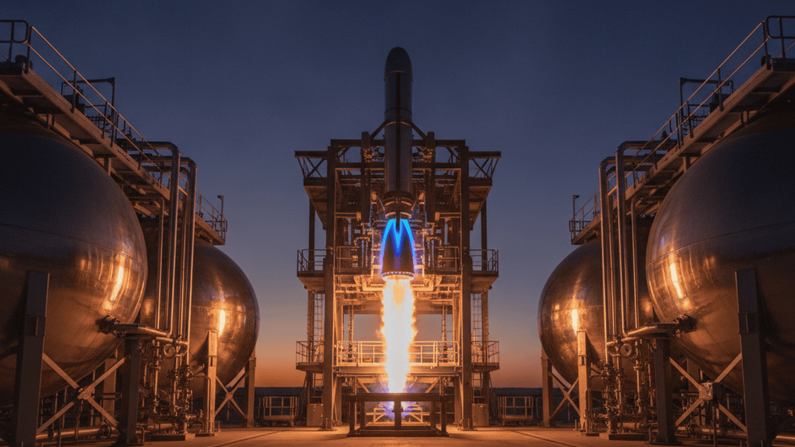 science-stoke-space-ffsc-engine-validation-ef788046 A rocket engine undergoes a high-pressure test fire on a vertical stand at a private aerospace facility.