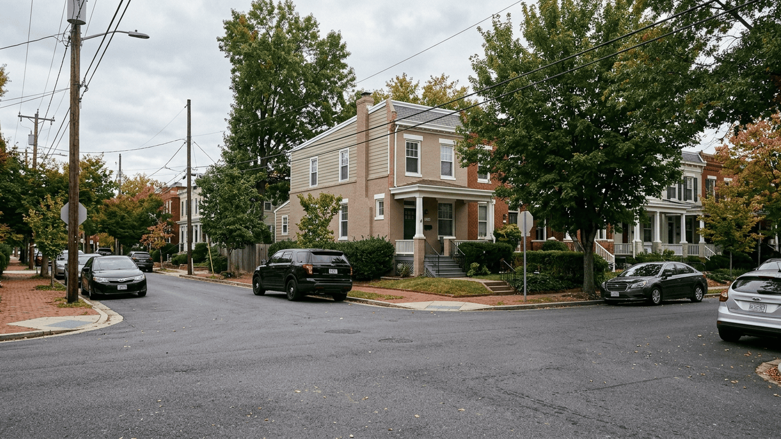 A Washington home and an unmarked vehicle illustrate the reported federal raid on Representative Ilhan Omar’s residence.