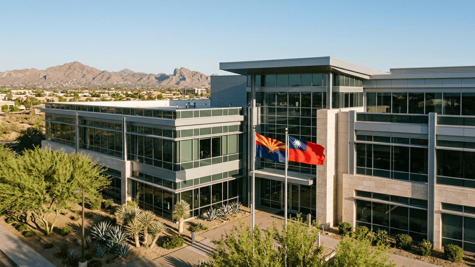 A Phoenix office building with Taiwanese and Arizona flags outside its entrance.